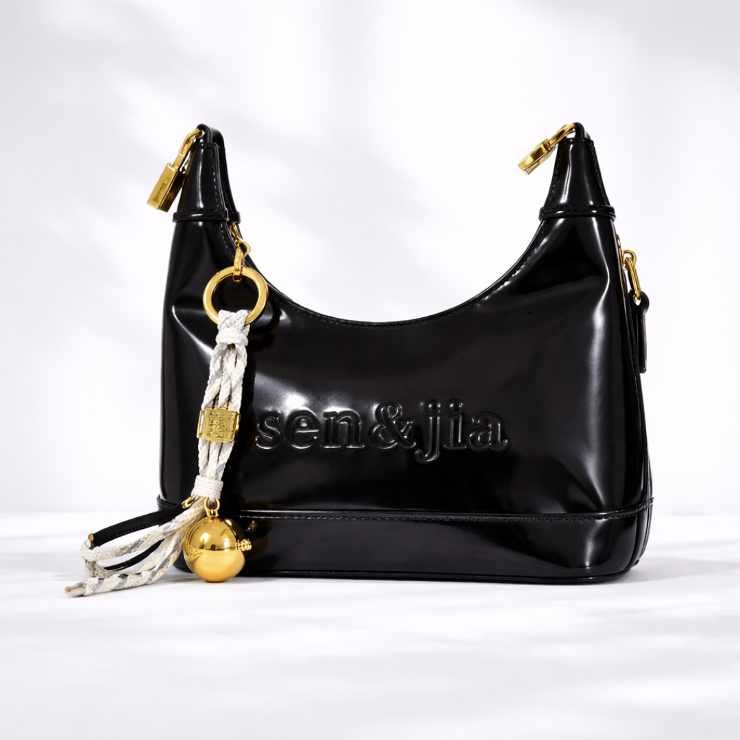 Elegant Cream Mini Shoulder Bag with Gold Charm